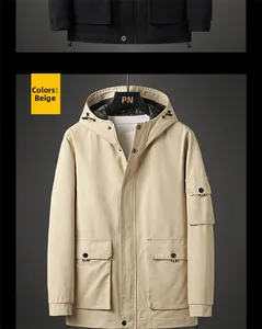 Detailed close-up of hooded cargo jacket featuring drawstring and utility pockets in beige