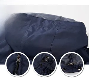 Detailed macro view of windproof hood design with high-quality metal zippers and elastic cords