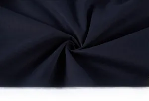 Macro shot of navy blue thick fabric texture with smooth and soft fleece lining detail