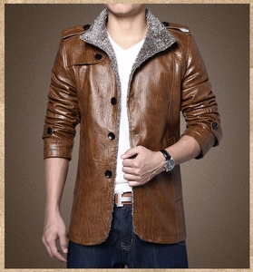 Detail of men's brown jacket featuring crocodile texture and gray faux shearling collar