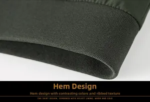 Detail of dark green jacket hem featuring ribbed knit design and velvet lining texture