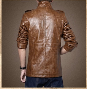Detailed back view of brown leather jacket with unique linear embossed texture and shoulder tabs