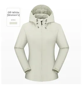 Detailed view of beige women outdoor jacket featuring adjustable drawstring and stand collar