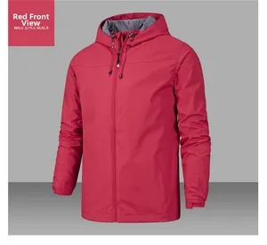 Detail of red waterproof outdoor jacket featuring drawstring hood and velcro cuffs