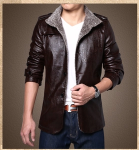 Detail of faux leather jacket with crocodile texture and light grey plush collar lining