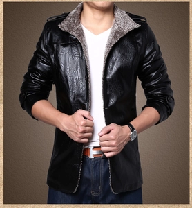 Detail of men's black faux leather jacket with grey fur collar and embossed texture