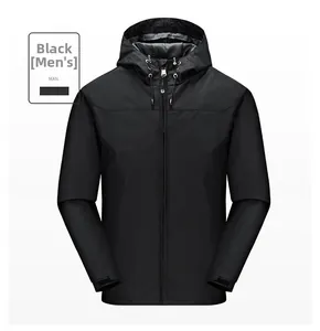 Detail of black waterproof windbreaker showing adjustable hood and velcro cuffs on sleeve