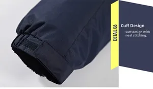 Detail view of adjustable velcro cuffs on deep blue waterproof outdoor jacket