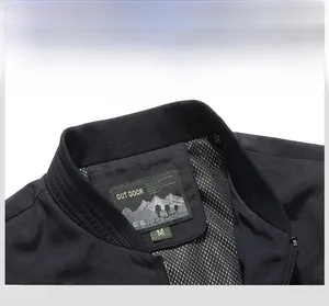 Close-up of navy blue outdoor jacket featuring rib-knit collar and mesh lining detail