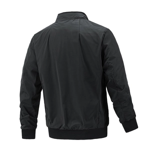 Slim fit black men's jacket with stand collar and ribbed hem shown from the back view