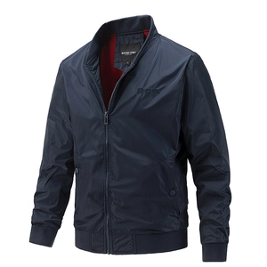 Navy blue men's bomber jacket with stand collar and contrasting red lining