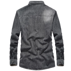 Back view of men's long-sleeve denim shirt in washed dark grey with yoke stitching