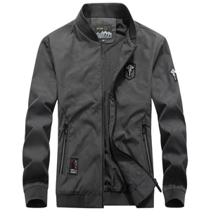 Men's dark gray camo bomber jacket with ribbed cuffs and outdoor shield patches