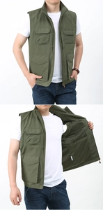 Detail of army green utility vest showing multi-pocket design and breathable mesh lining