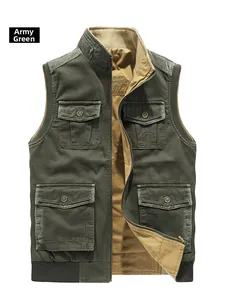 Detail of army green cotton vest showing multiple utility pockets and metal zipper closure