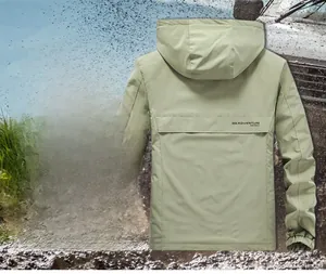 Detail view of the men outdoor military jacket showing windproof back vent and adventure print