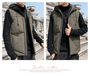 Detail of khaki quilted men's vest featuring a drawstring hood and side zip pockets