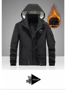 Close-up of black tactical jacket with warm fleece lining and mountain logo detail