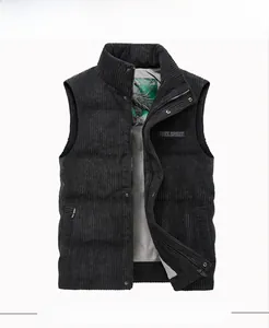 Detail of black corduroy vest featuring stand collar and Free Spirit chest text
