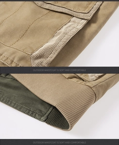Detail of double-stitched seams and ribbed trim on khaki cotton outdoor waistcoat