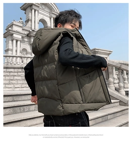 Detail of men's olive green hooded quilted puffer vest with snap button closure