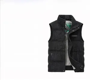 Detail of dark grey corduroy vest featuring stand collar and Free Spirit chest print