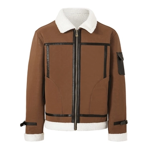 Close-up of brown suede pilot jacket with white sherpa collar and metal zipper details