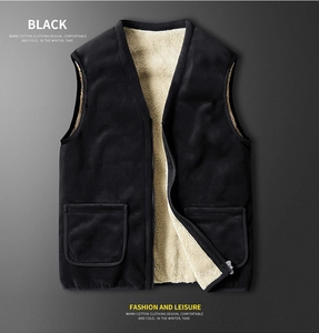 Detail view of black men's vest with warm fleece lining and sturdy silver zipper