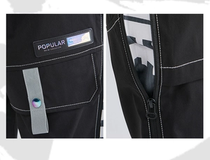 Detail of cargo pants with multi-pockets, novel patches and gradient metal buttons