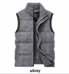 Detail of grey corduroy vest featuring vertical ribs and a Free Spirit brand label