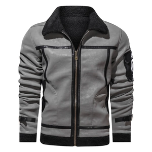 Detail of gray leather jacket with black fleece collar, metal zipper, and sleeve pocket