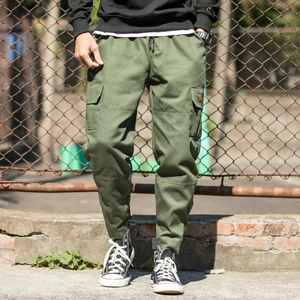 Men's olive green cargo jogger pants with side pockets and a drawstring waist style