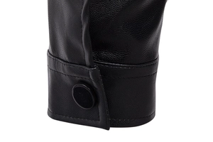 Detailed close-up of a black leather jacket cuff with lychee texture and button