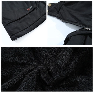 Détails de la veste de travail noire avec fermeture éclair métallique et doublure polaire