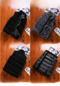Detail view of men quilted vest in black and gray with stand collar and inner lining