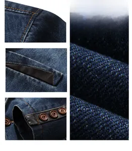 Detail view of heavy navy denim jacket showing reinforced stitching and leather pocket trim