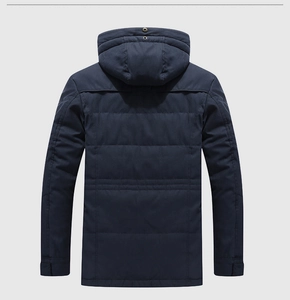 Rear view of men's navy blue quilted winter parka with hood and windproof fabric texture