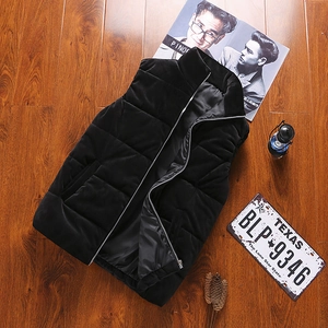 Men's black quilted velvet vest with stand collar and warm padding on wooden floor