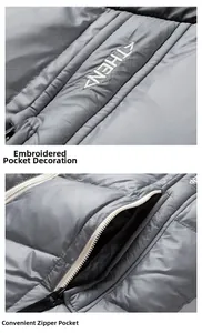 Gros plan d'un gilet matelassé gris avec broderie blanche et poche zippée fonctionnelle