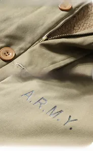 Detailed views of military jacket featuring khaki cotton twill, zipper and warm fleece lining