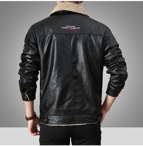 Close-up of men's leather jacket featuring wool collar and outdoor freedom back embroidery