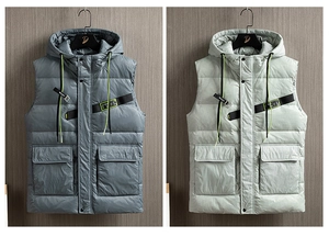 Detail of hooded quilted vest showing windproof fabric, large pockets, and woven label