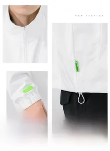Detail view of white stand collar men jacket showing zipper and green elastic cuffs