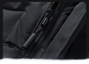 Close-up of durable metal zipper and premium textured black fabric on men's padded vest