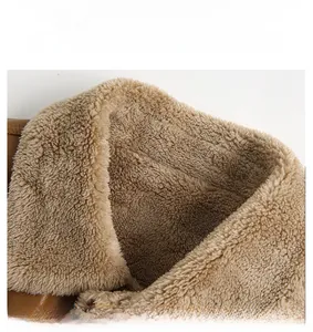 Detail of faux leather jacket sleeve featuring warm fleece lining and sturdy cuffs