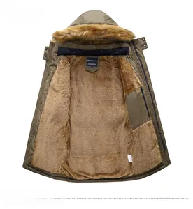 Detail view of khaki winter parka with warm faux fur lining and detachable hood collar