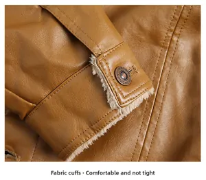 Detail of brown PU jacket cuff with warm faux shearling lining and vintage button