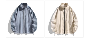 Detailed view of sleeve texture and drawstring hem on a men's zip-up casual jacket