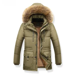 Close-up of olive green winter parka with plush faux fur lining and large fur hood