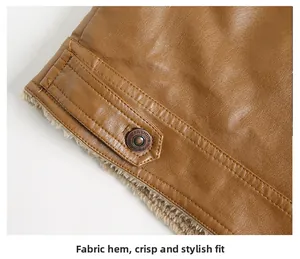 Close-up of brown PU leather jacket hem with plush fleece lining and fashion buckle detail